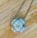 Moissanite necklace. A FIERY certified 3ct “8 hearts, 8 arrows” Moissanite in a super flashy geometric zircon halo, for a 4cttw necklace!