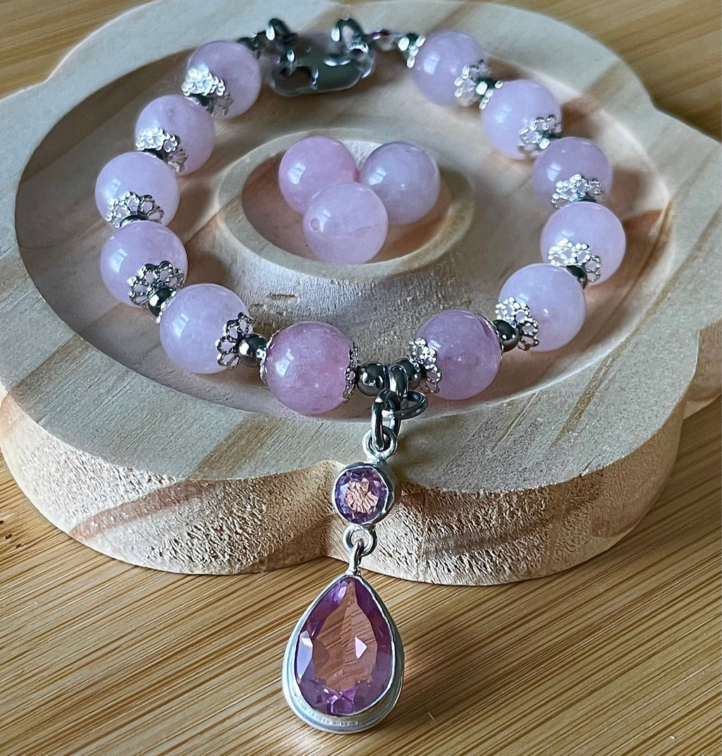 Rose quartz bracelet with 10mm Brazilian rose quartz beads and durable stainless steel components! The morganite pendant is optional.