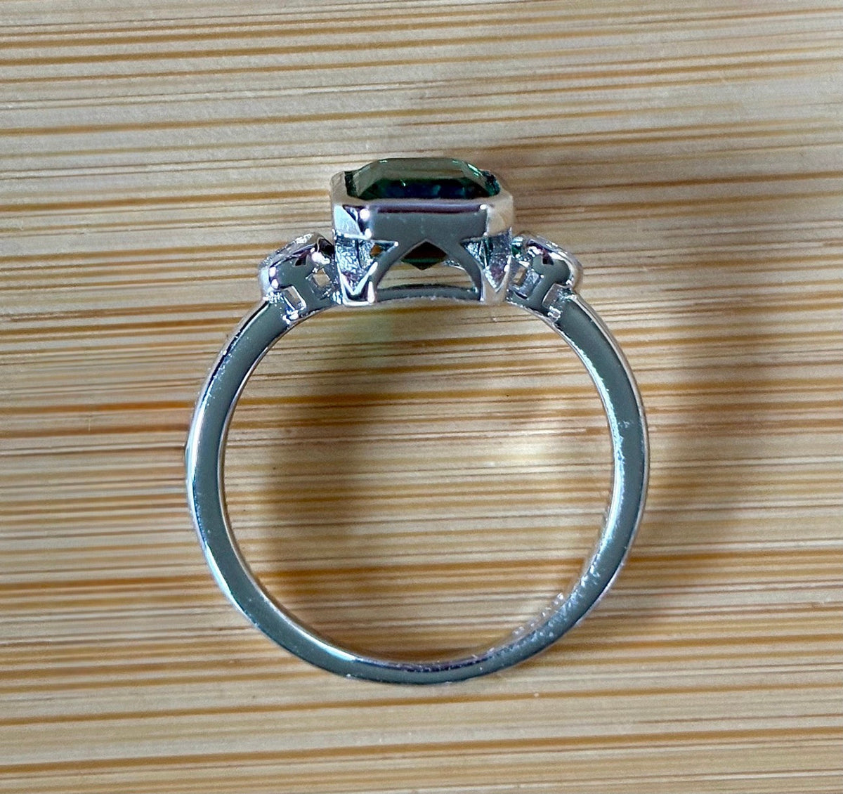 Emerald and Moissanite ring. A certified 2ct lab-grown emerald-cut Zambian emerald and .20cttw Moissanite ring! Exclusive to my shop!