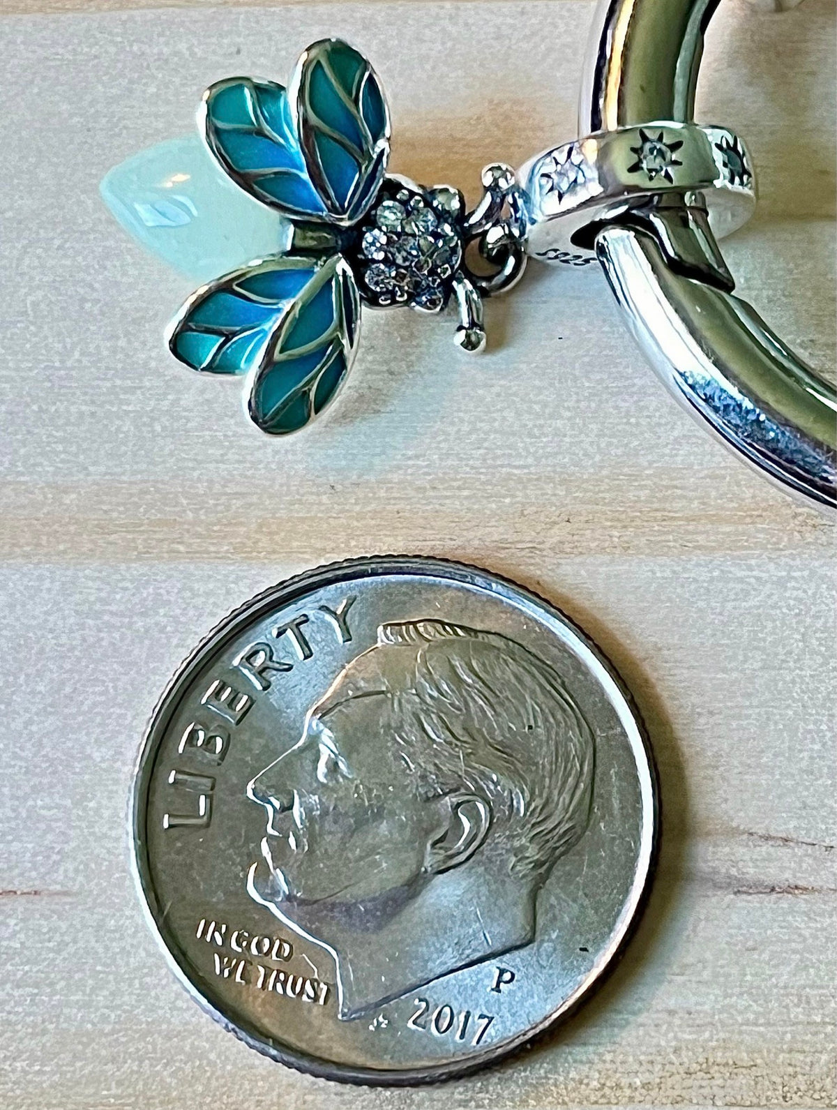 Dragonfly charm, rose charm, tree of life charm and lightning bug charm that glows in the dark! All solid sterling silver charms!