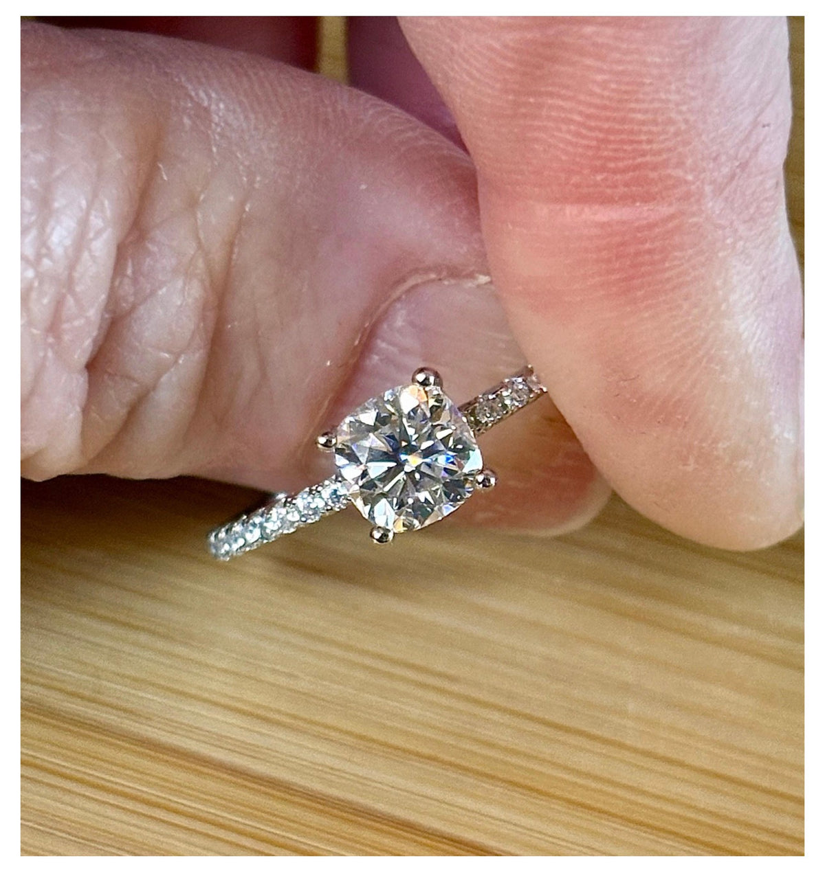 Moissanite solitaire. A certified 1ct cushion-cut Moissanite with pavé-set zircons in 925 sterling OR pavé-set Moissanites in 935 Argentium!