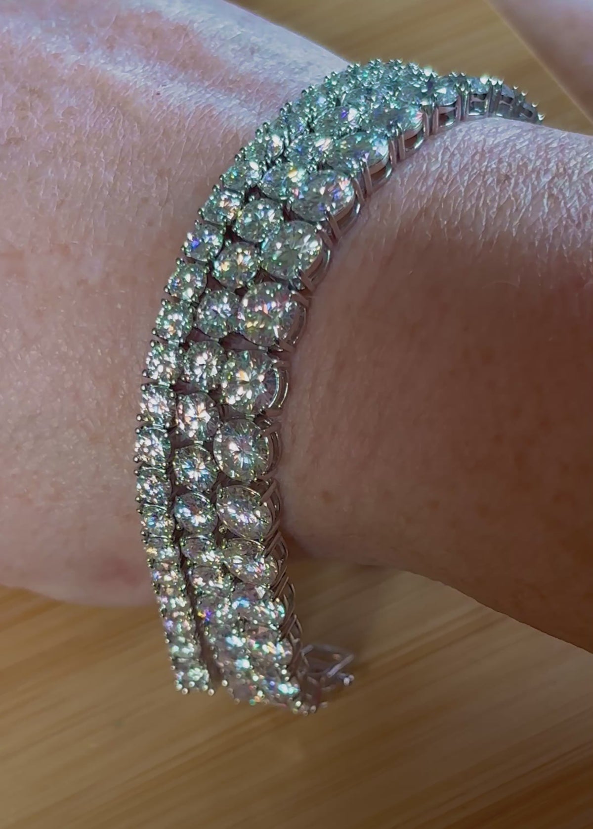 The certified “Ultimate Moissanite Tennis Bracelet” with masterful construction and “invisible” clasp in Argentium OR sterling silver!
