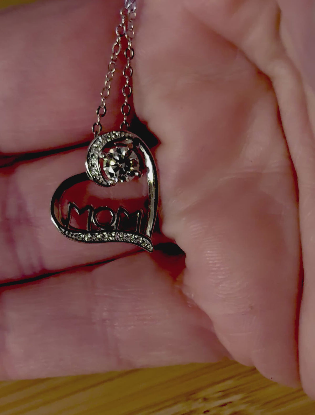 Moissanite necklace. A certified 1/2ct round radiant Moissanite in a pendant just for your mom or because you’re a mom, in sterling silver with zircon accents!