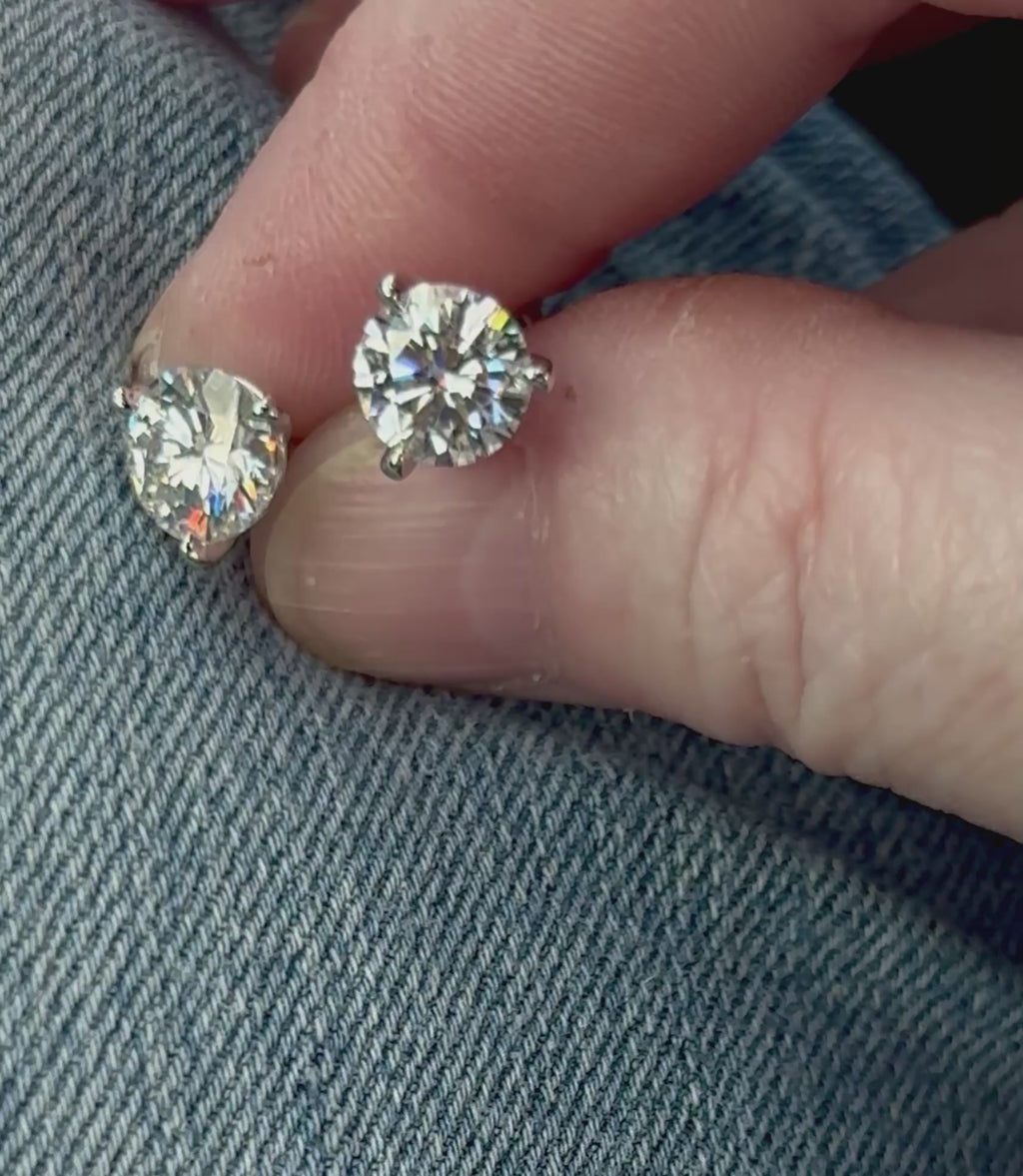 Moissanite earrings. A 4cttw certified pair of Moissanite martini studs with screw-on ear nuts - a simply elegant, classic & STUNNING pair!