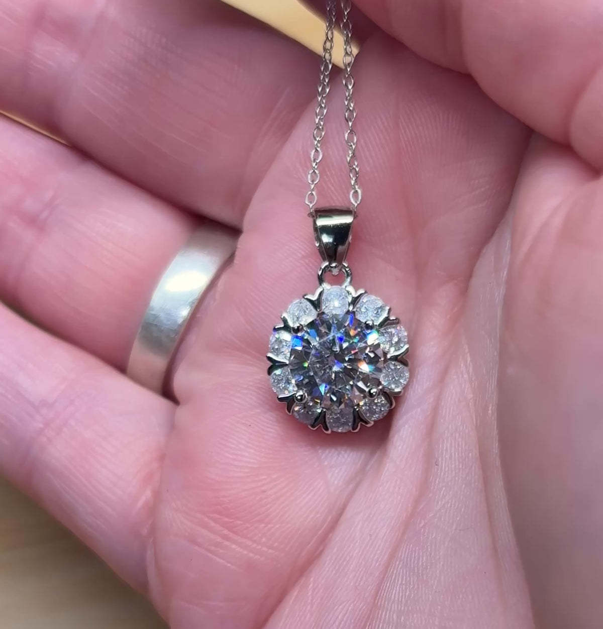 Moissanite necklace. A 3ct certified round brilliant Moissanite in a snowflake-shaped pendant ! A perfect piece for the holidays and beyond!
