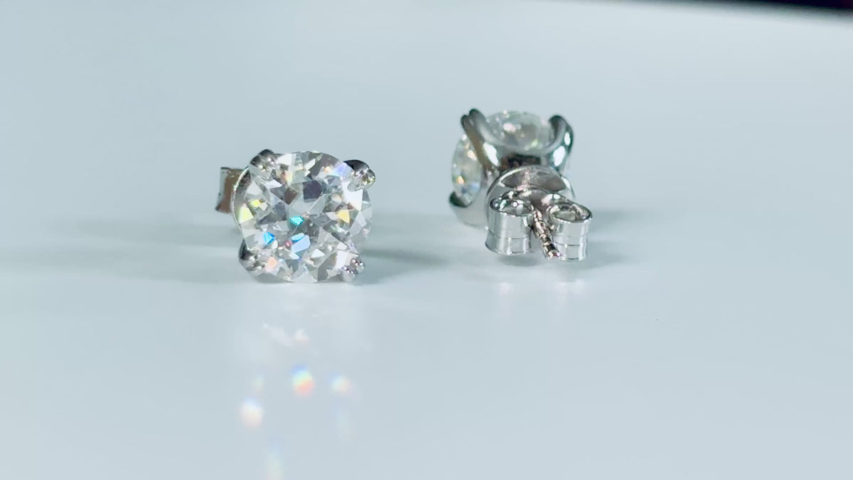 A lovely DOUBLE certified pair of 4cttw Old European Cut Moissanite studs in 935 Argentium silver and 18k double-claw mountings!