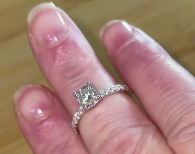 Moissanite solitaire. A certified 1ct cushion-cut Moissanite with pavé-set zircons in 925 sterling OR pavé-set Moissanites in 935 Argentium!