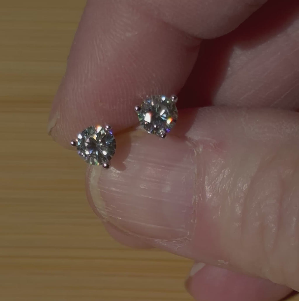 1ctw DOUBLE certified Moissanite studs, D-color and VVS1 clarity in delicate 3-claw settings! Minimalist design with substantial fire!