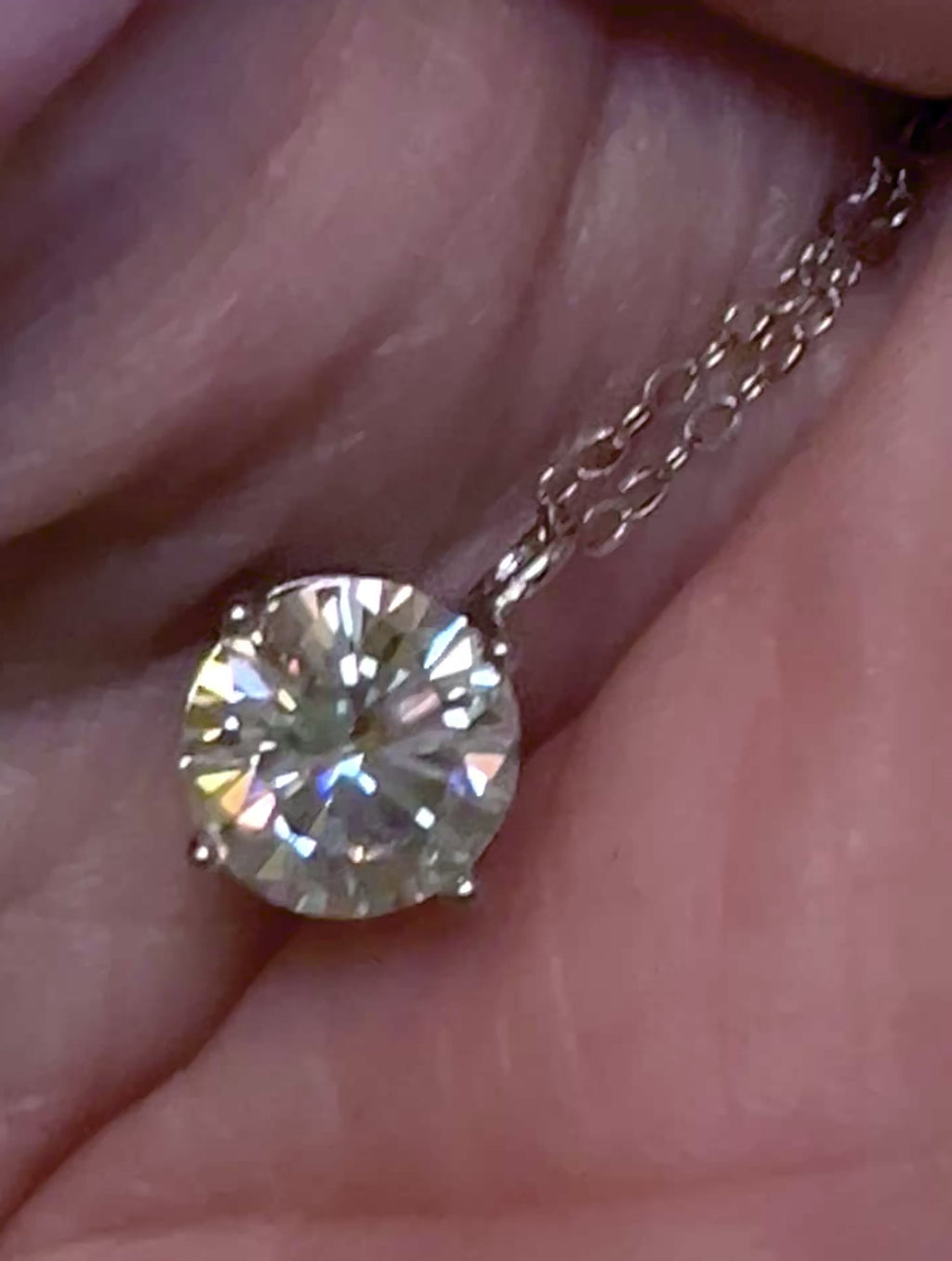 2ct Moissanite solitaire necklace. A 2ct “Floating Moissanite” in sterling silver creates the illusion of being suspended by nothing more than spider silk!