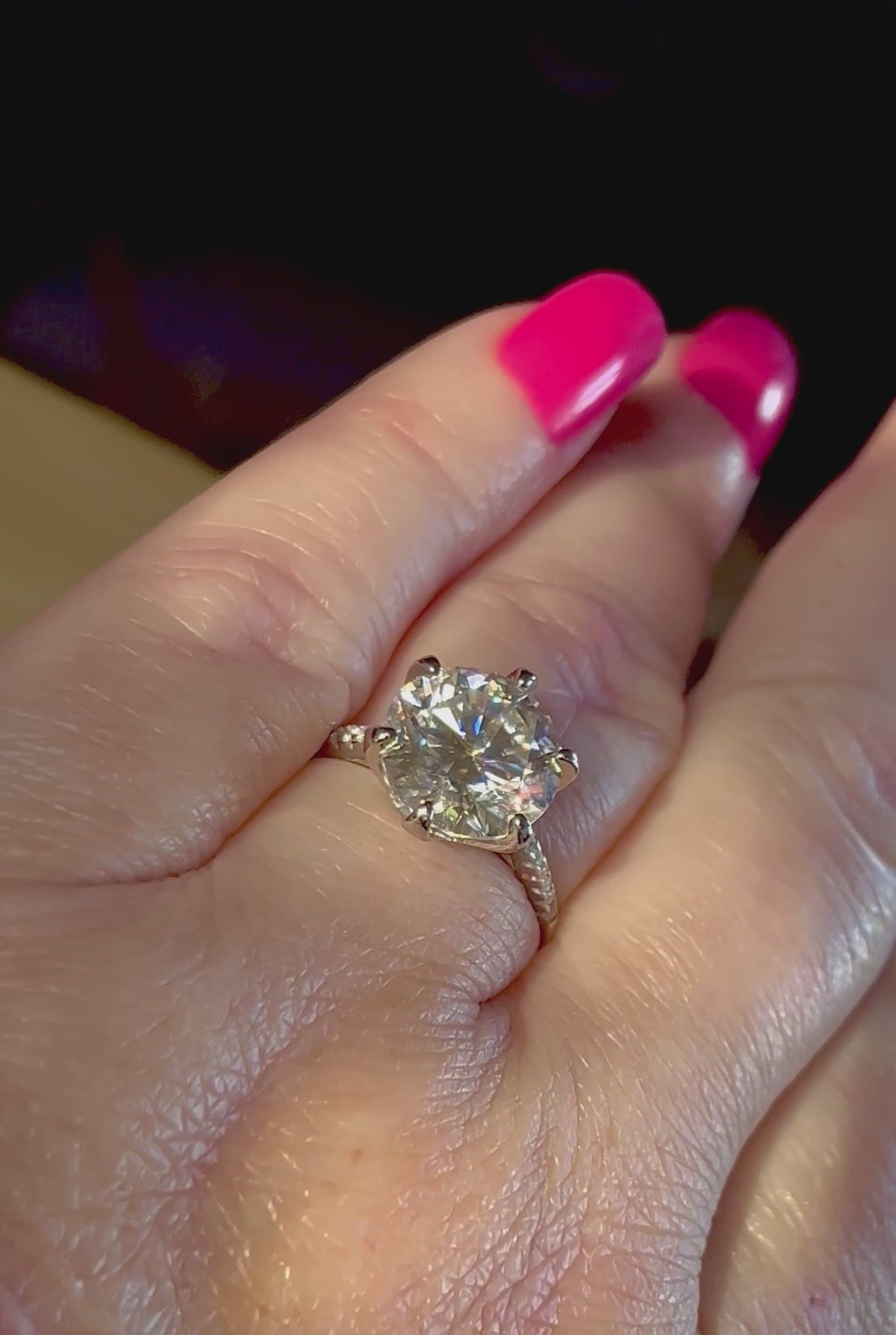 Moissanite ring. A certified 5ct Moissanite solitaire with zircon-accented shoulders, set in sterling silver and bathed in 18k!