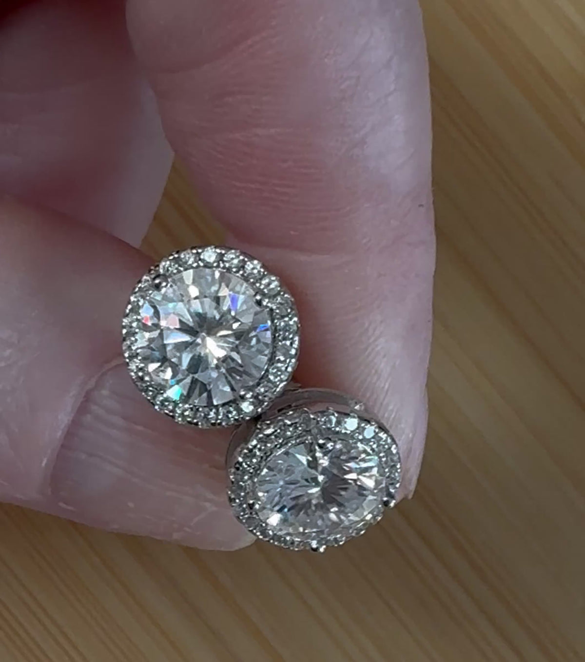 Moissanite earrings. A glittering 5.44cttw pair of certified Moissanites and white zircons in 18k gold-embraced sterling silver! Perfection!
