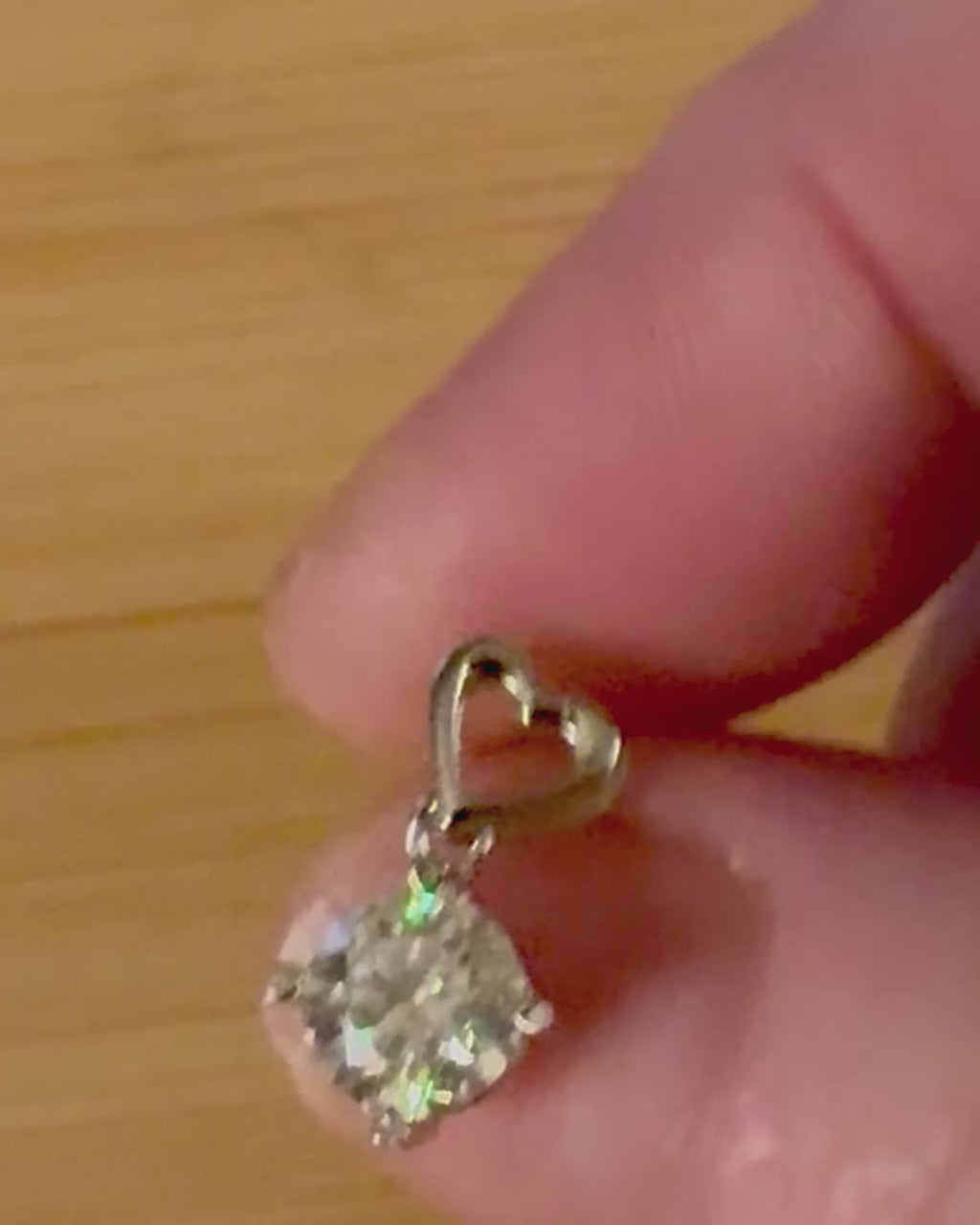 Moissanite earrings. Certified 2cttw round brilliant Moissanites dangling from heart-shaped posts are perfect for your Valentine (or you)!
