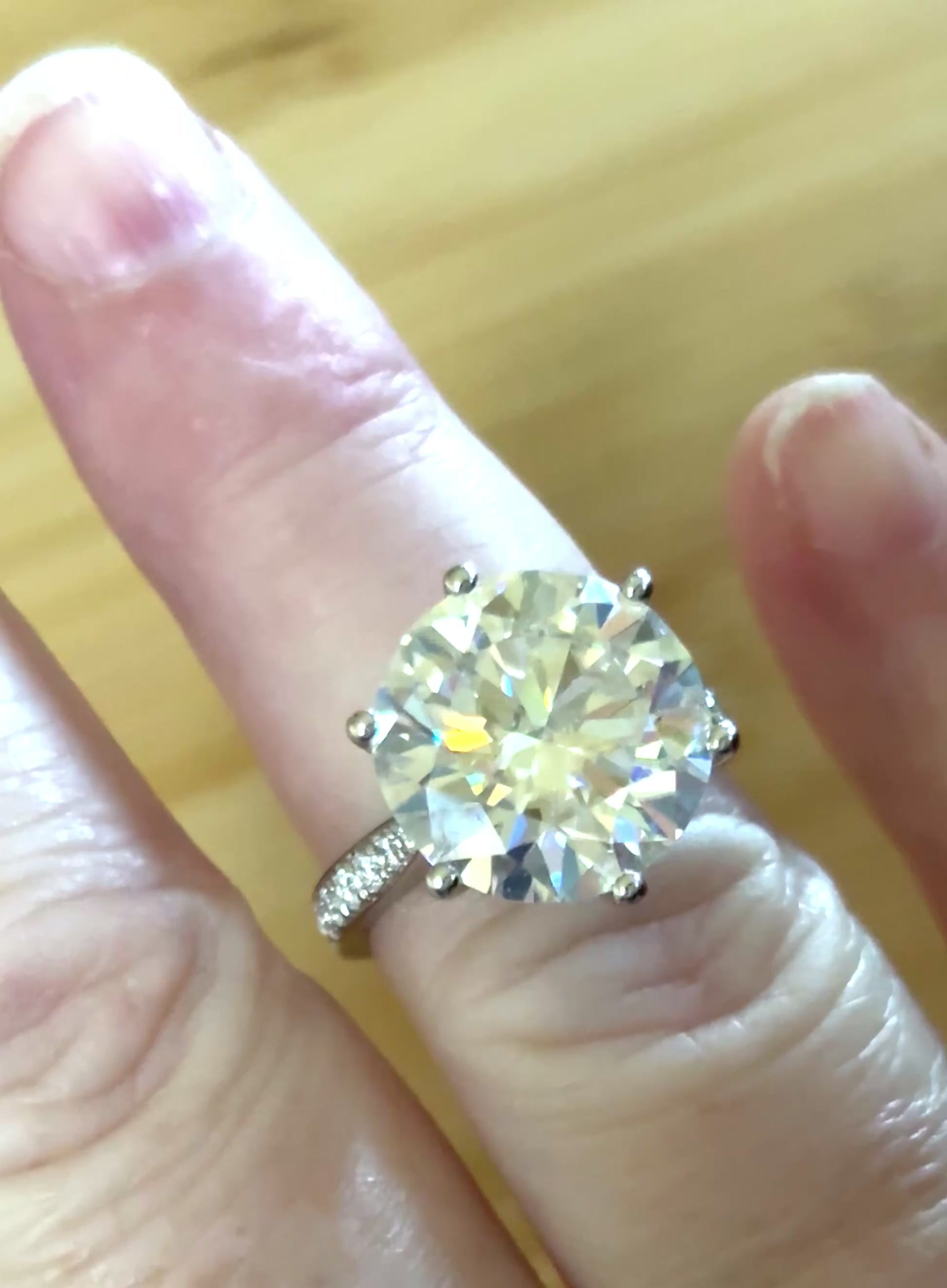 Moissanite ring. The 10ct certified 8H8A Moissanite “Tulip” statement ring with .50cttw Moissanite accents! Photos fail this GORGEOUS ring!