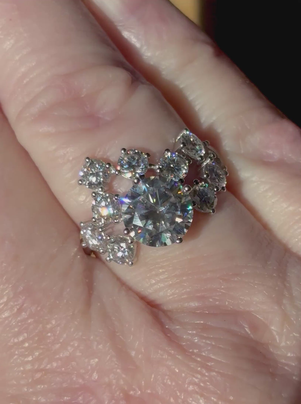 Moissanite ring. The “Moissanite Galaxy” ring features a 3ct certified Moissanite amid a 4cttw Moissanite constellation  - a 7cttw ring!