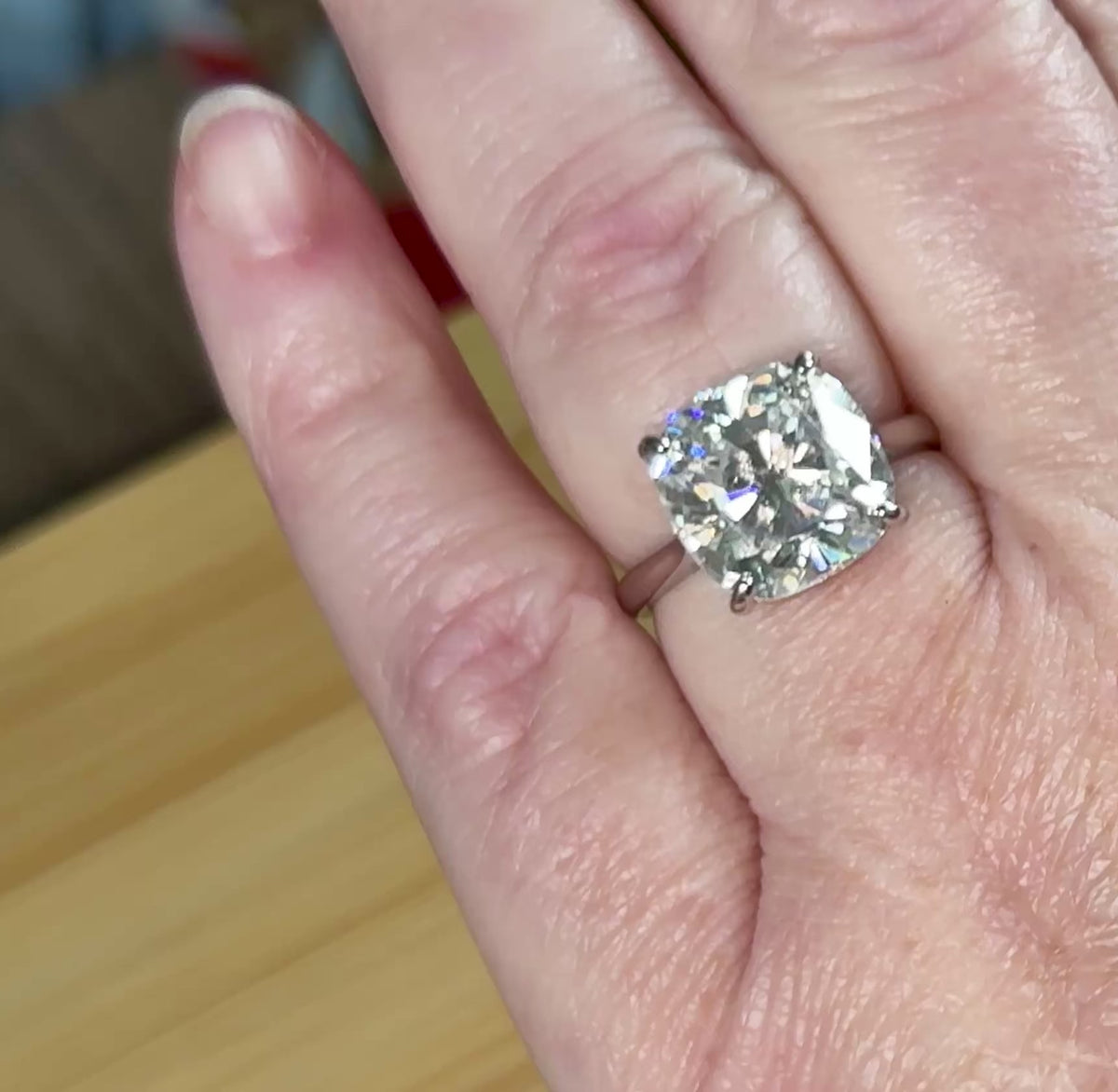 A fiery 9ct certified CLASSIC cushion-cut Moissanite solitaire, the ring of a certain princess (ex-princess?), but without the royal price tag! So indulge!