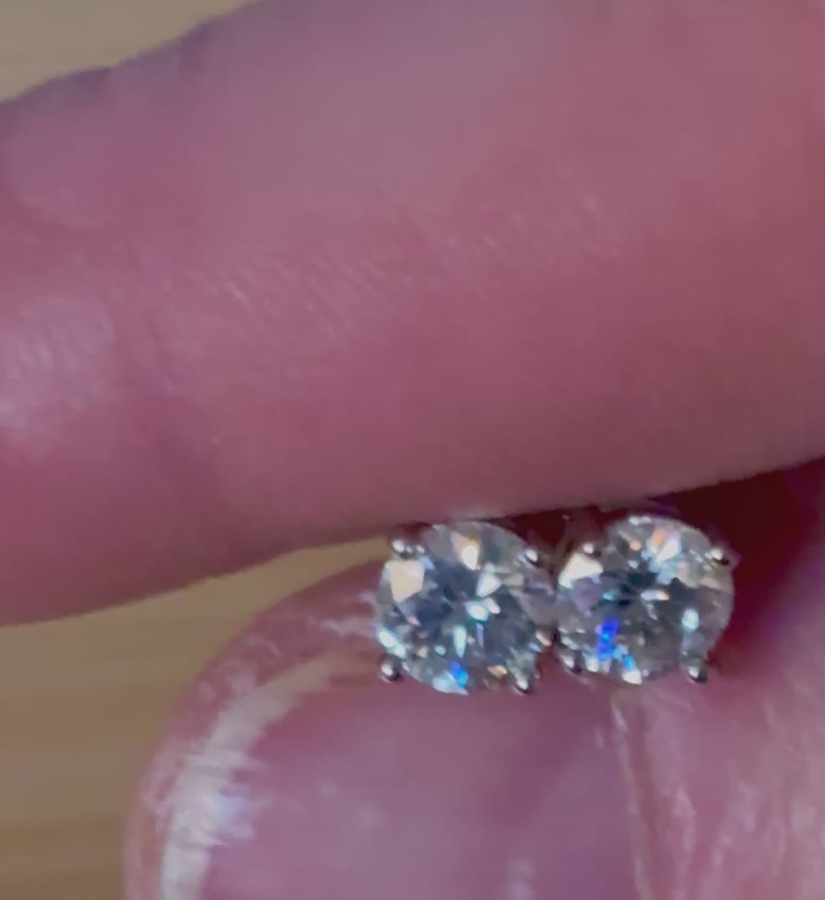 1cttw DOUBLE certified Moissanite studs with D-color and VVS1 clarity! Set in sterling silver bathed in 18k white gold, they’re a cut above!